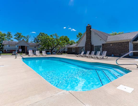 our resort style swimming pool is in front of our building with lounge chairs