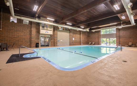 A large indoor swimming pool at Kimberly Club Apartments, Iowa