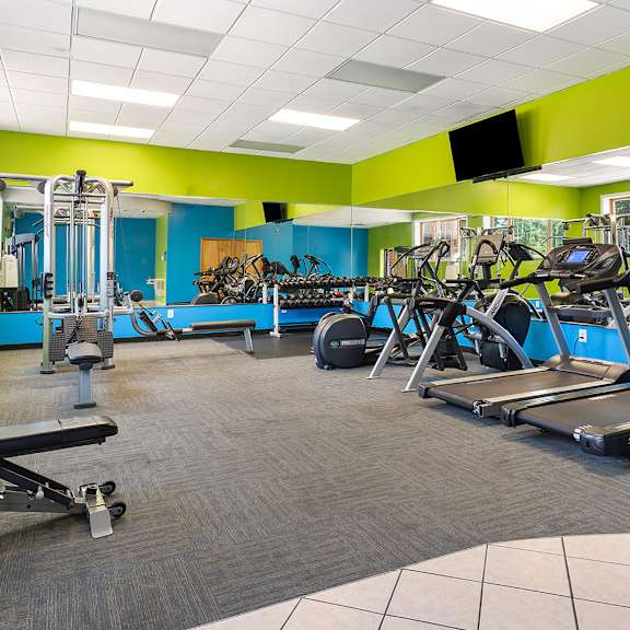 a gym with weights and other exercise equipment