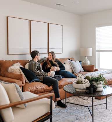 Couple Sitting On Sofa at Forge65, Pleasant Hill, IA, 50327