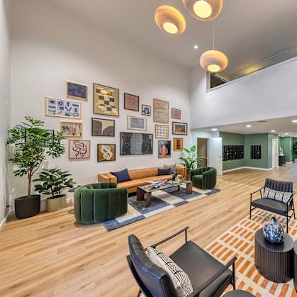 Lobby with seating and high ceilings at Oak Park City, Oak Park Illinois