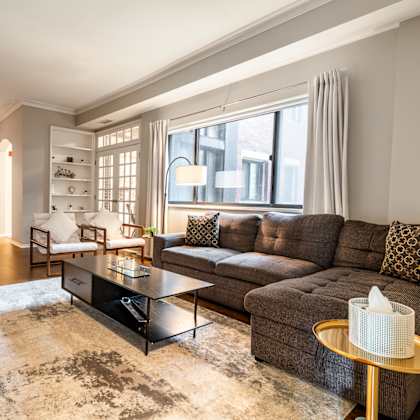 a living room with a couch and a coffee table