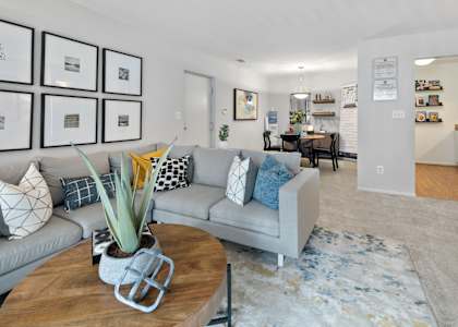 a living room with a couch and a table