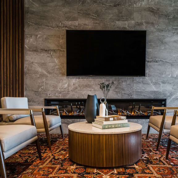 a room filled with furniture and a fire place  at The Colony, Charlotte