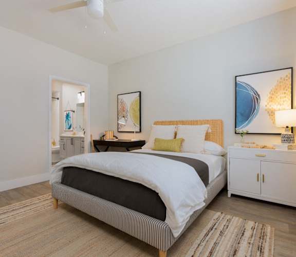 a bedroom with a bed and a closet