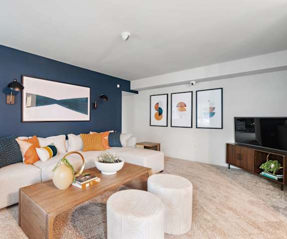 Living Room with Blue Walls at Falls Village Apartments, Maryland