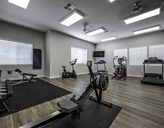 the gym at the flats at big tex apartments