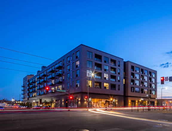 a large building with a traffic light in front of it