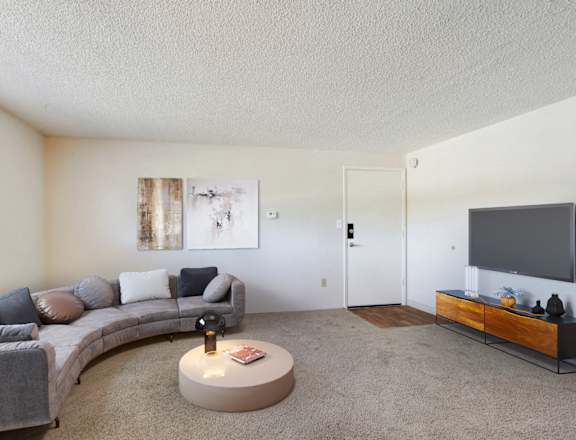 Living Room With TV at Golden Arms Apartments, Colorado, 80401