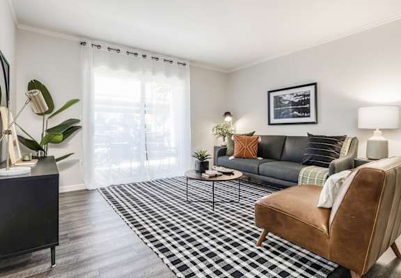 a living room with a couch and a chair