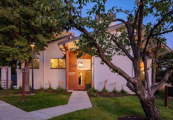 Clover Creek Apartments Exterior Leasing Office and Pathway