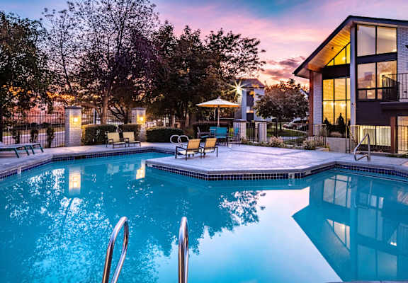 Clover Creek Apartments Pool Area at Dusk