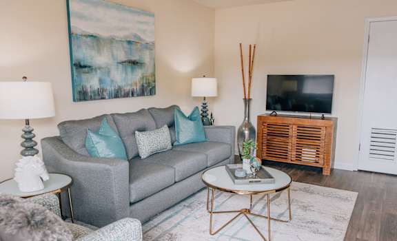 a living room with a couch and a television