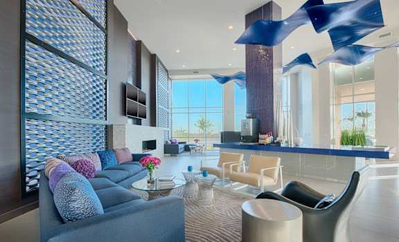 a living room filled with furniture and a large window at The View at Cascade Apartments, Scottsdale, Arizona