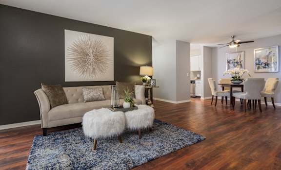a living room with a couch and a table