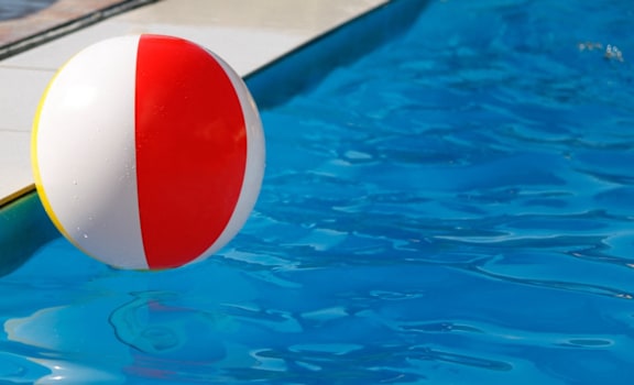a beach ball in a swimming pool