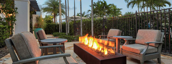 Outdoor lounges allow you to enjoy the Florida weather throughout the year at Windsor at Delray Beach, Florida
