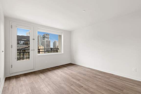 Room with window and door at AVIA on Pike Street, Seattle, WA, 98101