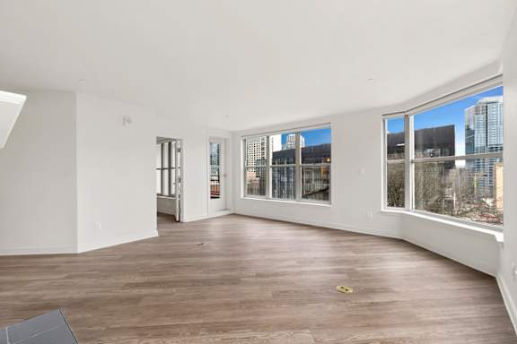 Room with multiple windows at AVIA on Pike Street, Seattle, Washington