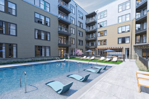 a swimming pool in the middle of an apartment building