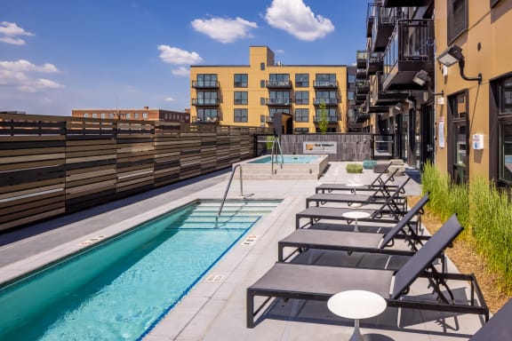 a view of the rooftop pool and hot tub