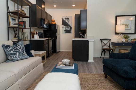 Living Room & Kitchen in a 2 Bedroom Apartment at 5100 Summit Apartments