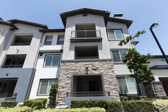 Exterior of apartment complex at The Grove Apartments, Ontario, CA, 91761