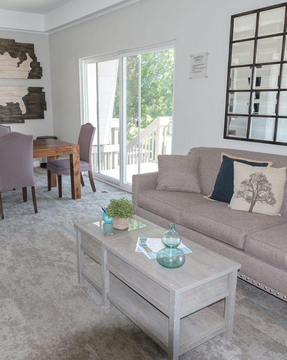 a living room with a couch and a table