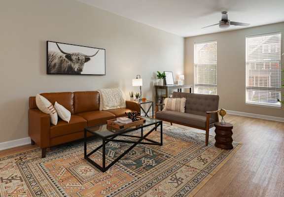 a living room with a couch and a coffee table at Adelphi Quarter, Columbus, 43203