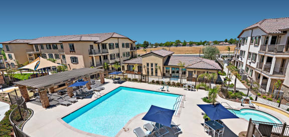 Pool area at Levante Apartment Homes in Fontana, CA