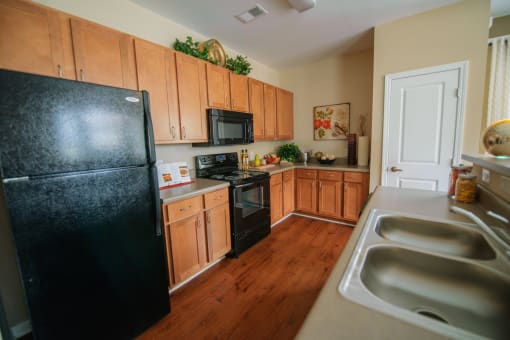 Kitchen, energy star black appliances, hardwood floors, kitchen pantry
