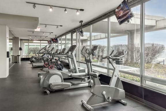 the gym at theia on the park condos