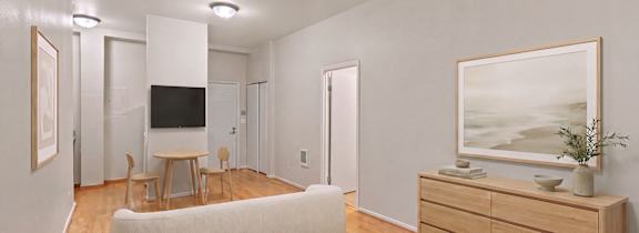 bedroom with a tv and window