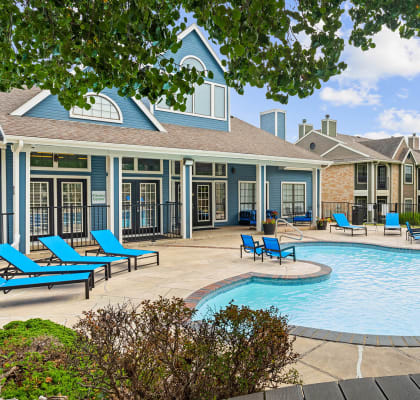 our apartments offer a pool and lounge area with chairs