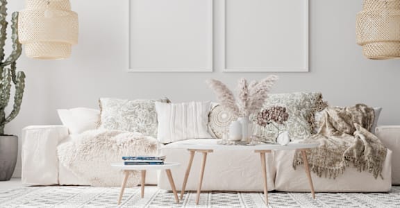 a white living room with a white couch and pillows at Tides on Southern, Mesa Arizona
