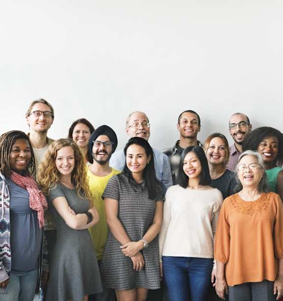 A group of diverse people standing together.