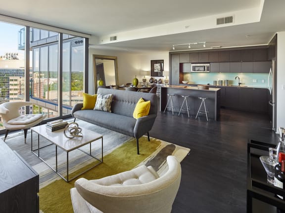 a kitchen with stainless steel appliances and granite countertops