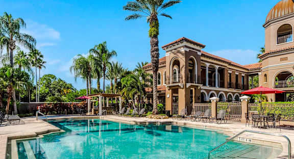 Resort pool with palm trees and Mediterranean architecture in St. Petersburg, Florida