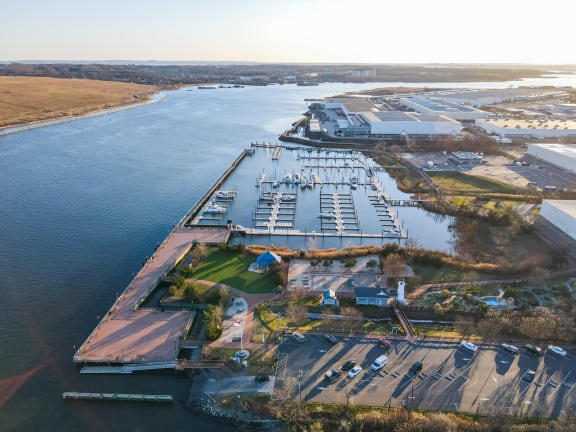 an aerial view of a marina on a body of water at The Botanic, Carteret, 07008
