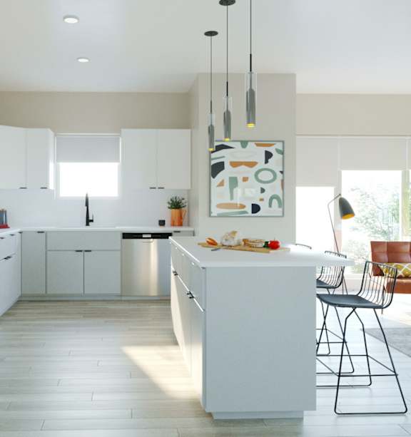 A modern kitchen with white cabinets and a large island.