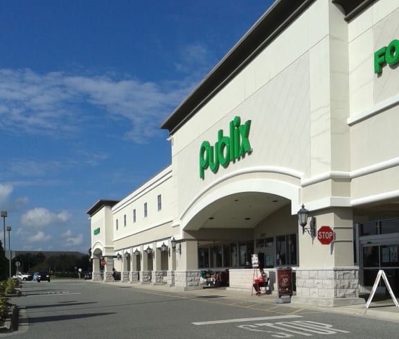 the front of a paulin store with a blue sky in the background
