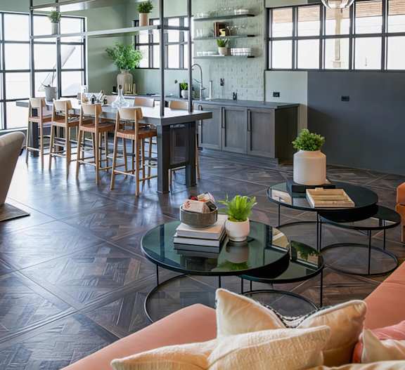 Intimate dining area with wet bar and plateful seating at Novel Cary