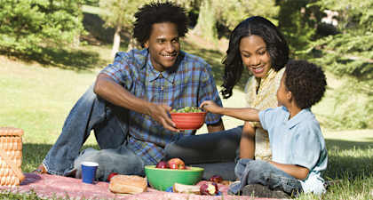 A family having a picnic in a park.