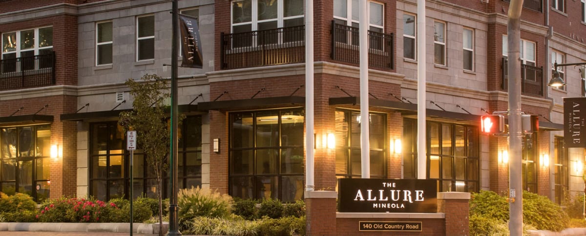 The Allure Mineola exterior at dusk - Mineola, NY