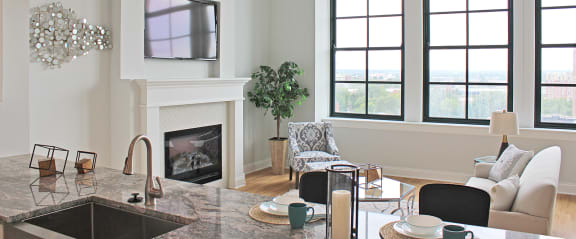 Luxury Vinyl Plank Flooring In Kitchen And Living Room at Residences at Halle, Cleveland