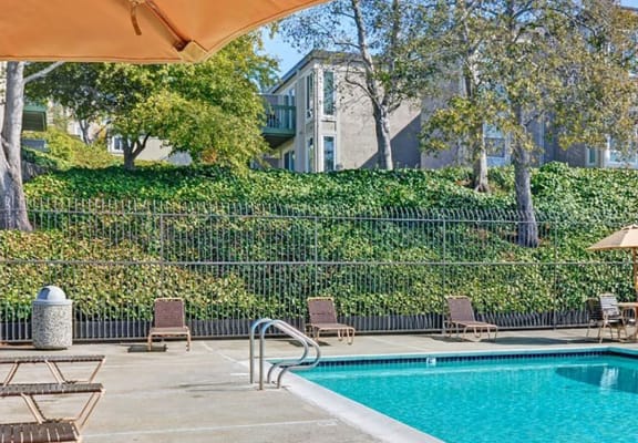 Pool seating at Baycliff Apartments in Richmond, CA