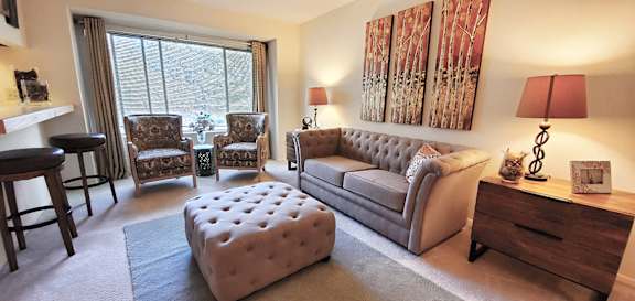 Living room area decor at The Bluffs at Clarys Forest Apartments, Columbia, MD