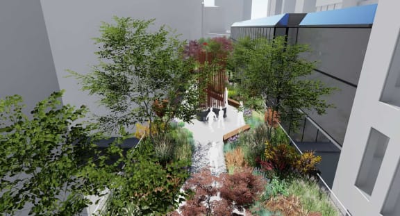 an aerial view of a garden on the top of a building
