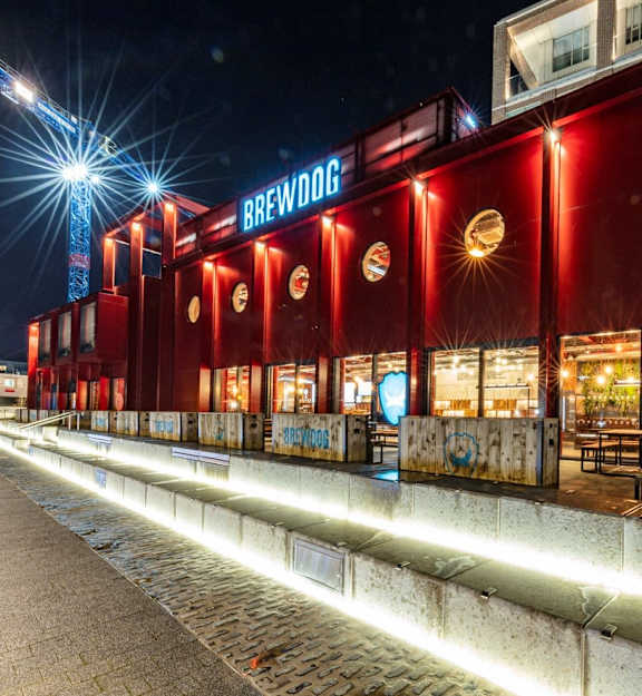 A red building with the word Brewdog on it.