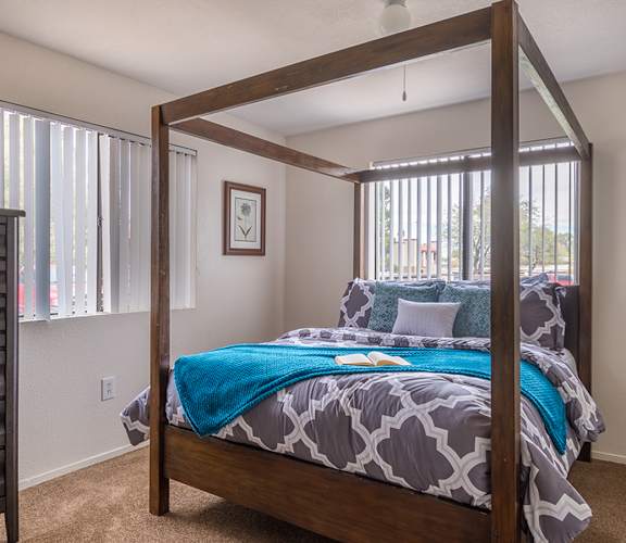 Cantera spacious master bedroom with nice natural lighting
